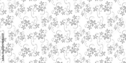 Subtle light grey seamless floral pattern, delicate blossoms and elegant swirling tendrils create a sophisticated decorative background texture