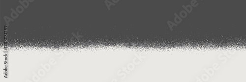 A simple abstract background featuring a gray top half and a white bottom half with a speckled border
