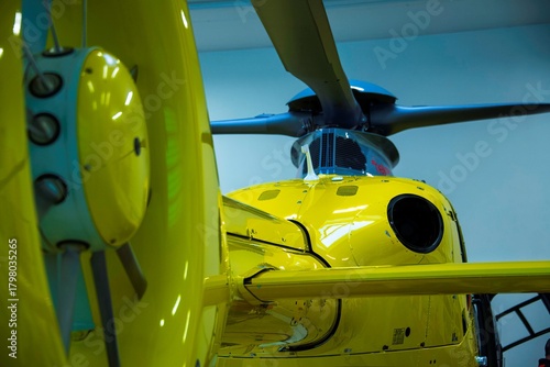 yellow helicopter rear view and close up