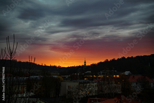 Fototapeta Naklejka Na Ścianę i Meble -  Stormy sky during sunrise over the city of Kamienna Góra. Lower Silesia, Poland