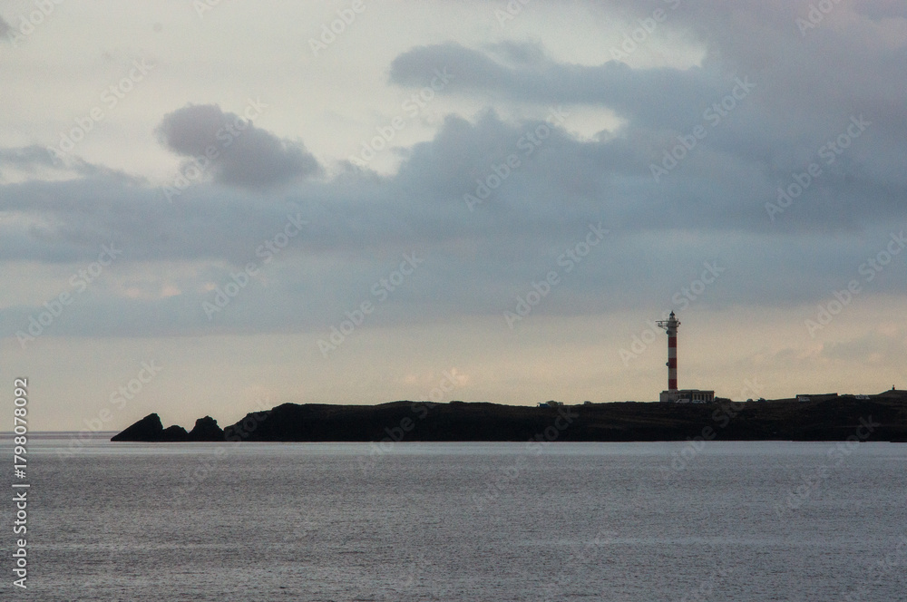 Fototapeta premium The Spanish Atlantic coast with a view of the lighthouse in the evening