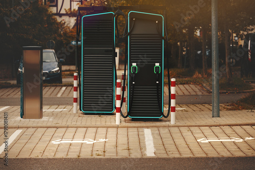 Modern electric vehicle fast charging stations in an urban environment. Clean energy infrastructure.