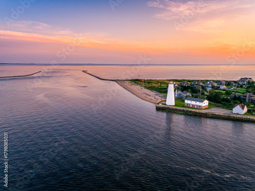 Lynde Point Lighthouse and the keeper's house stand on the coast of Old Saybrook, Connecticut, New England, USA.