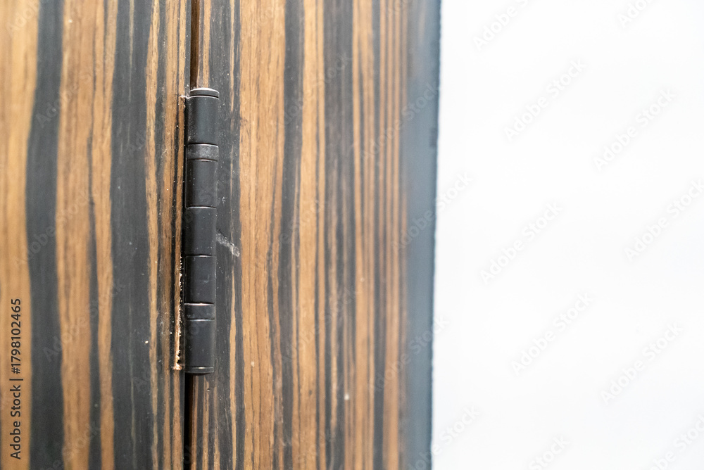 Obraz premium Close-Up of Wooden Door Hinge Detail