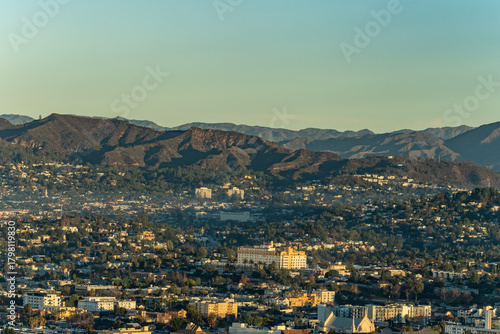 Fototapeta Naklejka Na Ścianę i Meble -  In the distance is Griffith Park,  is a large municipal park at the eastern end of the Santa Monica Mountains.  from InterContinental Los Angeles Downtown by IHG, California