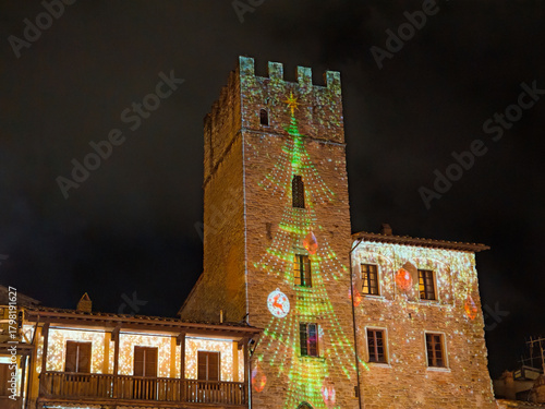 Night view of the famous Piazza Grande of Arezzo at christmas time in Tuscany, Italy