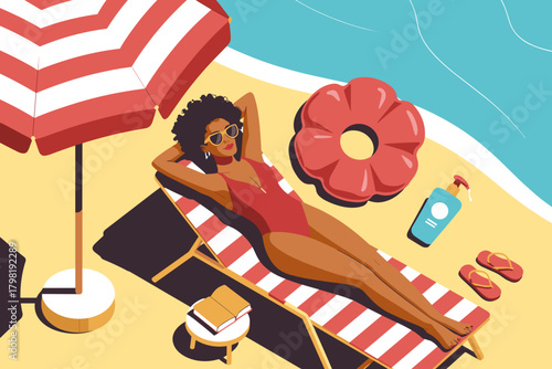 Sun-Kissed Woman Relaxing Under a Striped Umbrella on Vibrant Beach with Inflatable Flower