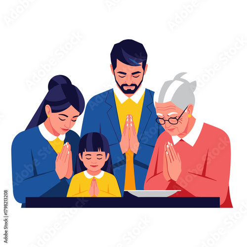 Family praying together with elderly woman at the dining table  
