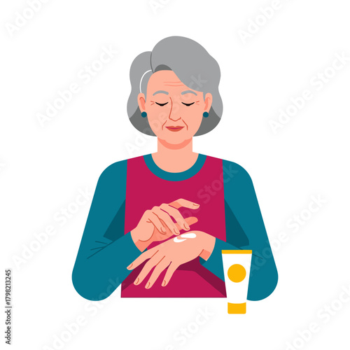 Senior woman applying moisturizer to hands while sitting comfortably  