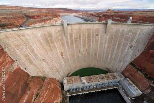 Upstream face of Glen Canyon Dam viewed from Glen Canyon Bridge, overlooking the Colorado River in northern Arizona, USA, October 11, 2025.