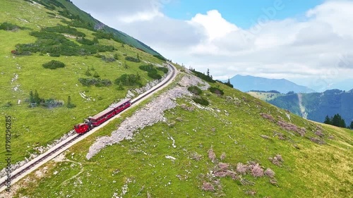 Drone Austria 4k. Schafberg Bahn, historic cog railway in Austria, it runs from St. Wolfgang up Schafberg mountain. popular summer travel tourism destination for hiking in Europe.