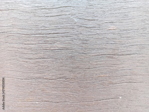 Wallpaper Mural Textured Timber: A close-up showcases the intricate grain and natural patterns of aged, weathered wood, revealing a timeless texture and rustic appeal. Torontodigital.ca