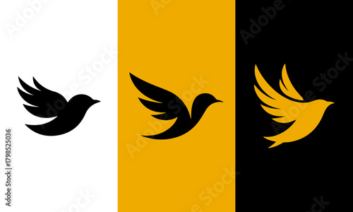 Silhouette of a flying bird in black yellow and gold on white yellow and black backgrounds
