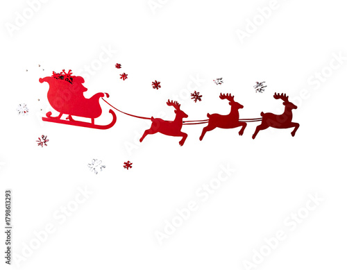 Red santa claus in a sleigh being pulled by three reindeer with snowflakes around them, isolated cutout