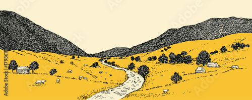 A yellow and brown landscape with a road running through it. The road is surrounded by trees and hills