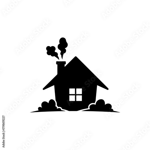 Simple Black Silhouette of a Cozy House with Smoke Coming Out of the Chimney and Bushes on a White Background
