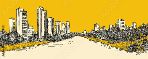 A city street with tall buildings in the background and a yellow sky