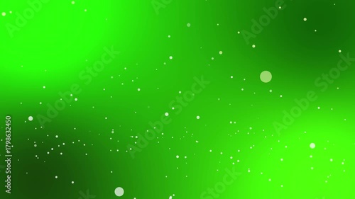 A seamless loop snowfall particle animation featuring soft falling snow paticles on a dark winter background.perfect for holiday video,titles,overlays,and chrismas project.