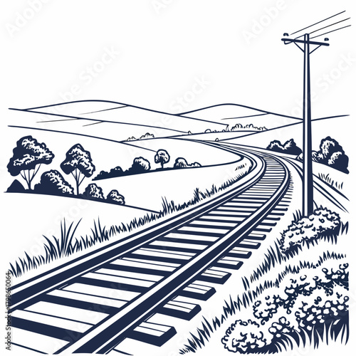 Railway track winding through a rural landscape isolated on