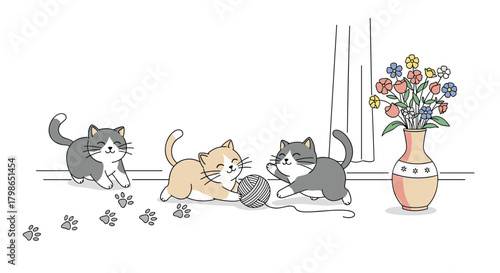 Three fluffy kittens playing with a ball of yarn next to a vase of flowers.