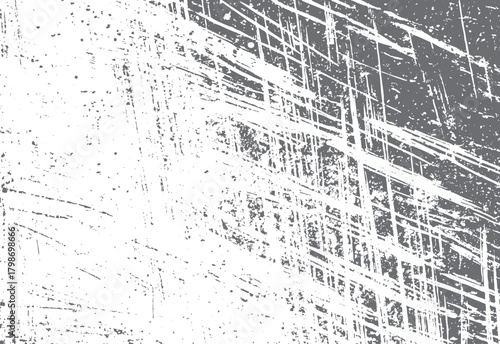 Abstract distressed grunge texture with random scratches and speckles in grey and white tones vector