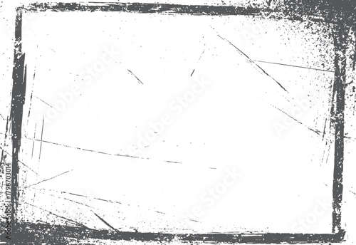 Grungy dark grey distressed rectangular frame with scratches and speckles on white background grunge