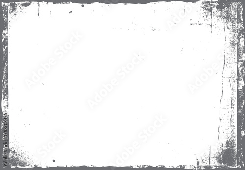 Grungy distressed grey and white textured border frame with rough edges and scattered speckles grunge
