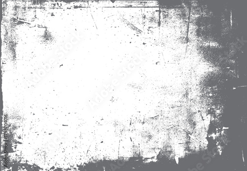 Grungy distressed texture background with scattered speckles and scratches in shades of grey and white