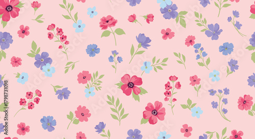 Elegant floral seamless pattern with vibrant pink, purple, and blue flowers alongside green leaves on a pastel pink backdrop, perfect for fabric or decor.
