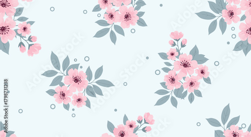 Seamless pattern with delicate pink cherry blossoms and grey leaves on a soft blue background, adorned with small scattered dots and rings.