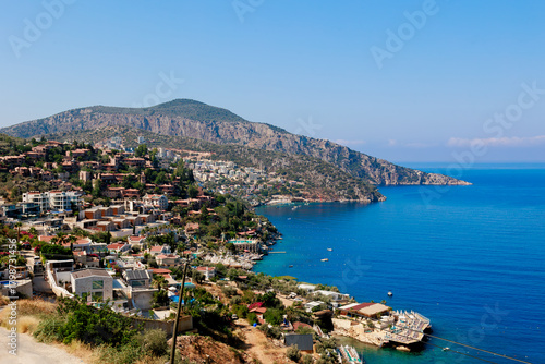The densely built-up coastline with its turquoise Mediterranean lagoon stretches into the distance, offering incredible views.