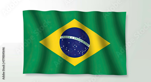 Waving flag of Brazil with green background and yellow diamond shape in the center.