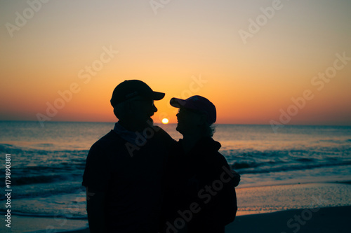 silhouette of a couple on the beach