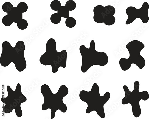 he image shows a pattern of irregular black shapes on a white background. blob shape