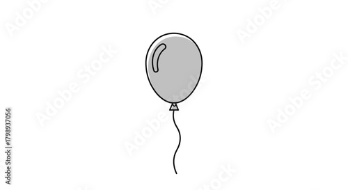 A single gray balloon floats gently in the air attached to a thin string.