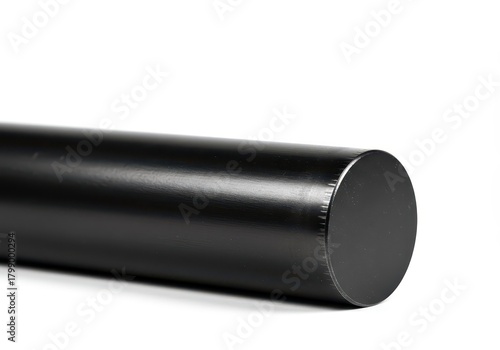 A solid, cylindrical black metal bar isolated against a clean white backdrop, highlighting texture, strength, and stark visual contrast ,black, round, component