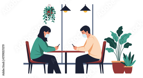 Two people sit at a table in a cafe wearing masks and looking at their phones.