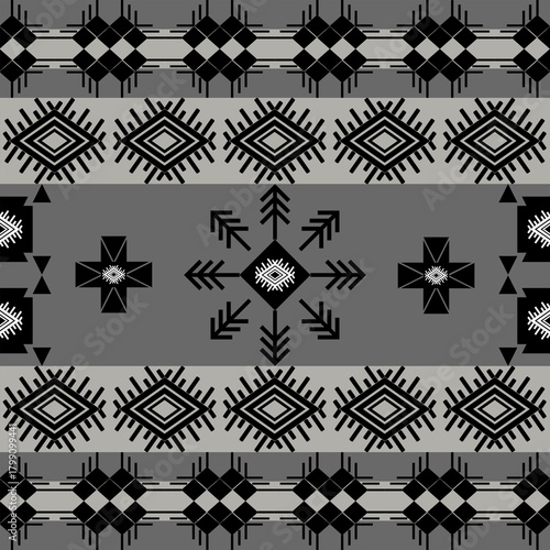Aztec  geometric vector background in black and white. Seamless stripe pattern. Traditional ornament tribal style. Design for textile, fabric, clothing, curtain, rug, ornament, wrapping.