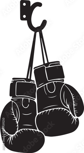 Vintage boxing gloves hang from hook ready for fight sports training and boxing day celebration