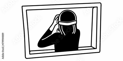 Silhouette of a woman wearing a head covering in a framed mirror adjusting the covering on her head here seen