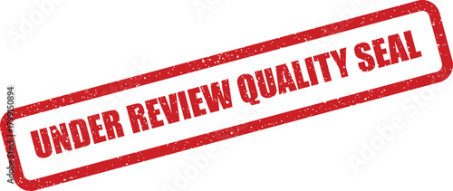 A grunge effect rubber stamp impression displaying UNDER REVIEW QUALITY SEAL text for official document marking