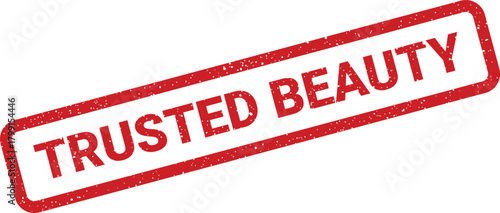 A rectangular red rubber stamp with a speckled texture, displaying the words TRUSTED BEAUTY at a dynamic angle