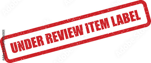Distressed rubber stamp impression indicating an item label is currently undergoing official quality review process