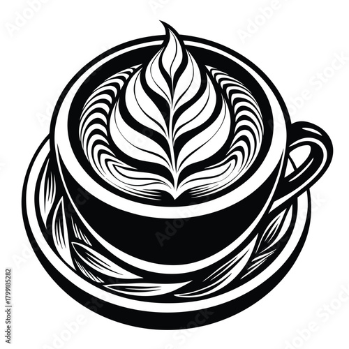 Latte art shows leaf pattern atop a cup on its saucer in monochrome