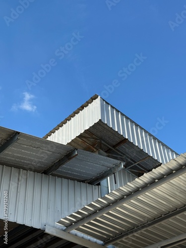 Factory building during day trip with blue sky