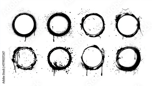 Black grunge circle frames with dripping ink edges and rough textured rings isolated on white background, providing bold abstract design elements with clear space for text