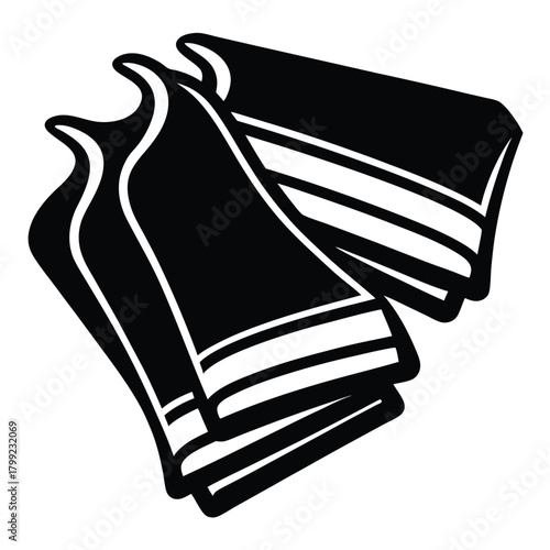 Stacked towels shown in black and white creates a minimalist and simple composition