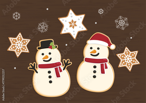 Top view of Christmas snowman cookies on wood table