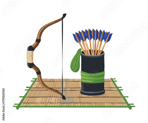 Traditional oriental bow standing next to a black arrow quiver for archery meditation and ancient warrior practice