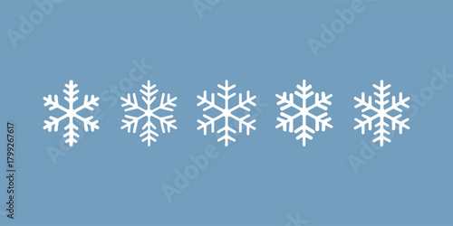 white snowflakes on blue winter background minimalist seasonal illustration